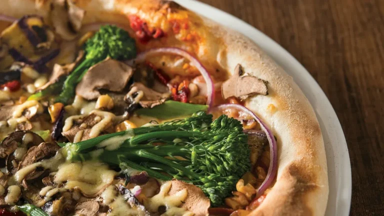 Discover top veggie toppings for healthier pizzas: artichokes, kale, spinach & more.