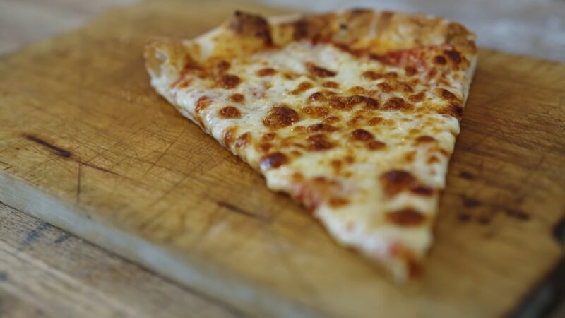 Serve pizza cut on the board