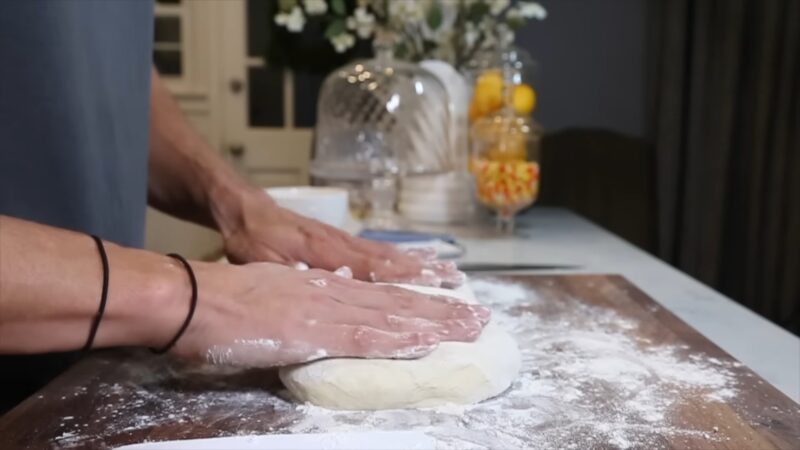 kneading dough for pizza