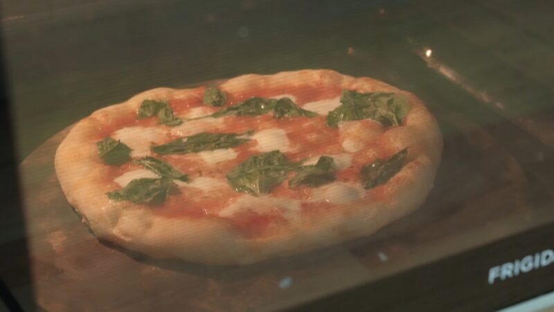 Watching pizza through the oven window