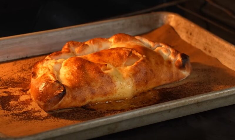 Golden-brown calzone, ready to be savored