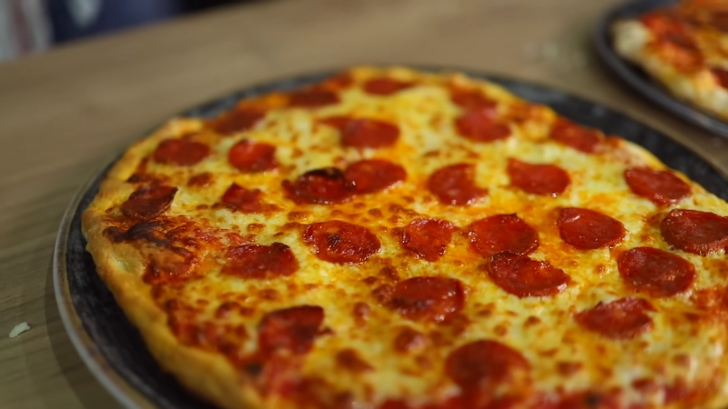 A freshly baked pepperoni pizza with a golden crust