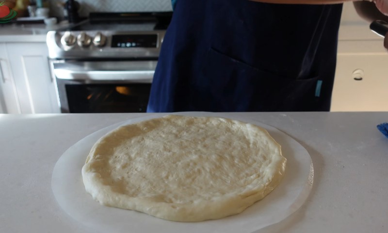 A pizza dough on a countertop